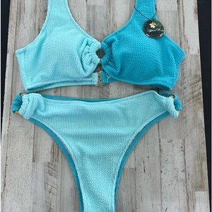 NEW never worn, two-piece bikini, size medium, teal blues